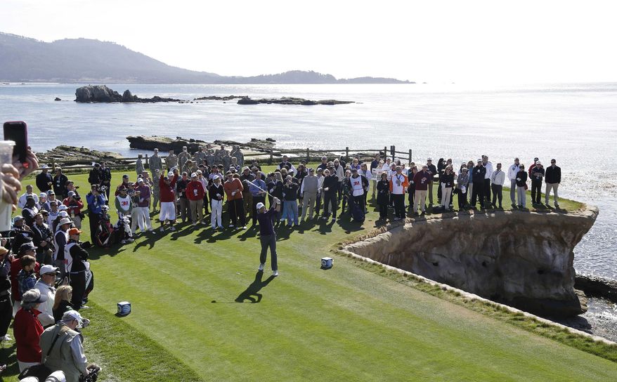Actor Ray Romano hits from the 18th tee of the Pebble Beach Golf Links during the celebrity shootout event of the AT&T Pebble Beach Pro-Am golf tournament on Wednesday, Feb. 5, 2014, in Pebble Beach, Calif. (AP Photo/Eric Risberg)