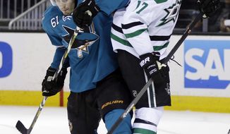 San Jose Sharks&#39; Justin Braun (61) collides with Dallas Stars&#39; Rich Peverley (17) during the second period of an NHL hockey game on Wednesday, Feb. 5, 2014, in San Jose, Calif. (AP Photo/Marcio Jose Sanchez)