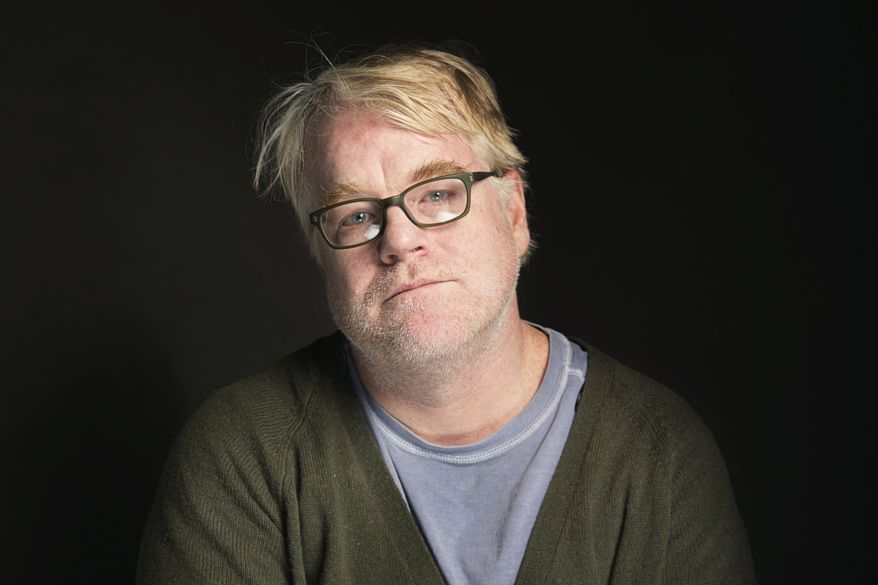 FILE - In this Jan. 19, 2014 file photo, Philip Seymour Hoffman poses for a portrait at The Collective and Gibson Lounge Powered by CEG, during the Sundance Film Festival, in Park City, Utah. Hoffman, 46, who won the Oscar for best actor in 2006 for his portrayal of writer Truman Capote in "Capote," was found dead Sunday, Feb. 2, in his New York apartment. A New York City couple arrested on low-level cocaine possession charges amid the investigation into Philip Seymour Hoffman's death has been released. Lawyers for Juliana Luchkiw  and Max Rosenblum, both 22, say they had nothing to do with Hoffman's death Sunday in a suspected heroin overdose.  (Photo by Victoria Will/Invision/AP, file)