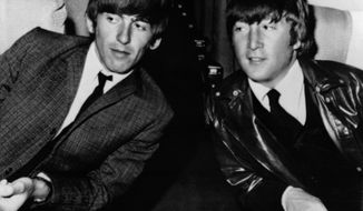 FILE - In this May 25, 1964 file photo, the Beatles&#39; George Harrison, left, and John Lennon, are seen aboard an airplane in Los Angeles, before leaving for London. In the fall of 1963, Harrison spent two weeks visiting his sister Louise Harrison in Benton, Ill., making him the first Beatle to come to the United States. That vacation was five months before the group&#39;s landmark live appearance on &amp;quot;The Ed Sullivan Show&amp;quot; launched the British invasion. While in Illinois, Harrison and the Beatles were virtually unknown in America, explaining why he enjoyed anonymity in 7,000-resident Benton. (AP Photo/File)