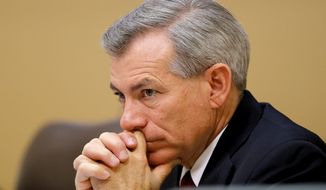 **FILE** Rep. David Schweikert, Arizona Republican, listens Dec. 6, 2013, in Apache Junction, Ariz., to testimony during a House Oversight and Government Reform Committee Congressional Field Hearing on the Affordable Care Act&#39;s impact on Americans. (Associated Press)