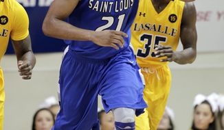Saint Louis&#39; Dwayne Evans (21) celebrates after he scored against La Salle in the first half of an NCAA college basketball game, Saturday, Feb. 8, 2014, in Philadelphia. (AP Photo/H. Rumph Jr.)