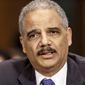 ** FILE ** In this Jan. 29, 2014, file photo, Attorney General Eric Holder testifies on Capitol Hill in Washington. (AP Photo/J. Scott Applewhite, File)