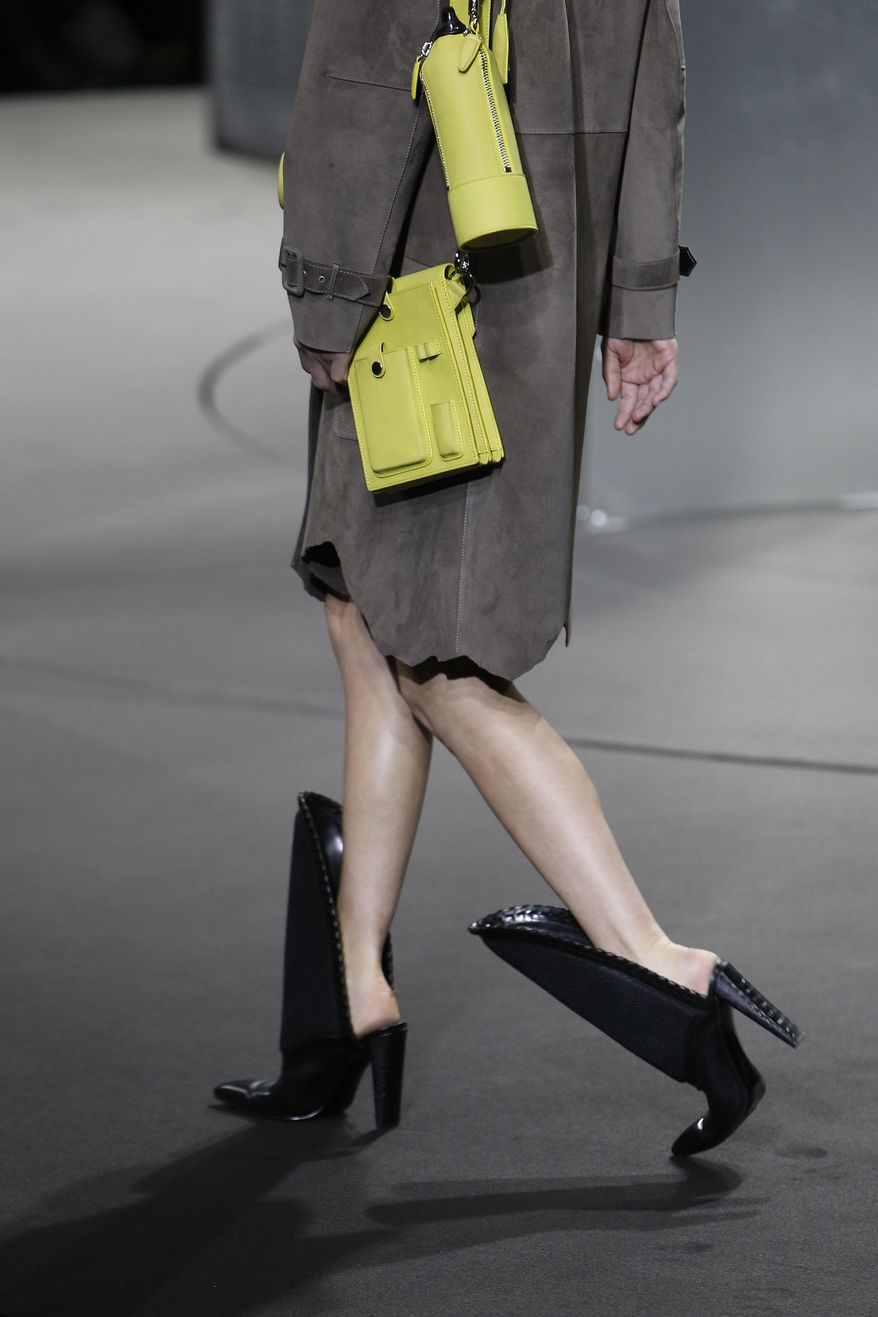 The Alexander Wang Fall 2014 collection is modeled during Fashion Week in New York, Saturday, Feb. 8, 2014. (AP Photo/Jason DeCrow)