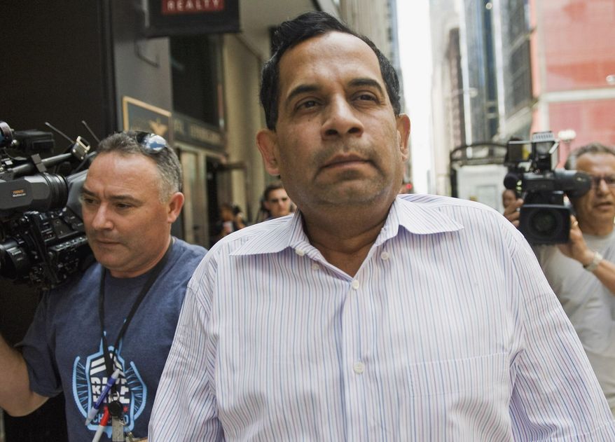 FILE - In this June 20, 2012 file photo, Chicago-area businessman Raghuveer Nayak leaves the federal building in Chicago. A sentencing hearing is scheduled on Monday, Feb. 10, 2014, at federal court in Chicago for Nayak, a longtime fundraiser to both imprisoned former Gov. Rod Blagojevich and imprisoned former Rep. Jesse Jackson Jr. He pleaded guilty to bribing physicians for patient referrals to clinics he owns. (AP Photo/Chicago Sun-Times, Rich Hein, File)  MANDATORY CREDIT, MAGS OUT, NO SALES