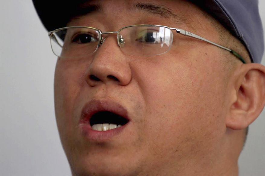 FILE - This Jan. 20, 2014 file photo shows American missionary Kenneth Bae speaking to reporters at Pyongyang Friendship Hospital in Pyongyang. North Korea has canceled for a second time its invitation for a senior U.S. envoy to visit the country to discuss the long-detained American's possible release, the State Department said Monday, Feb. 10. The cancellation comes only days after Bae told a pro-Pyongyang newspaper that he expected to meet this month with the envoy. (AP Photo/Kim Kwang Hyon, File)