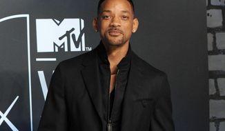 FILE - This Aug. 25, 2013 file photo shows Will Smith at the MTV Video Music Awards at the Barclays Center in the Brooklyn borough of New York.  NBC announced Monday, Feb. 10, 2014, that Will Smith will appear on the Feb. 17 debut of “The Tonight Show Starring Jimmy Fallon.” U2 will perform. Justin Timberlake will close out the week, which will also include appearances from Michelle Obama, Will Ferrell, Bradley Cooper, Kristen Wiig and Jerry Seinfeld. Lady Gaga, Arcade Fire and Tim McGraw will also perform during the week. (Photo by Evan Agostini/Invision/AP, File)