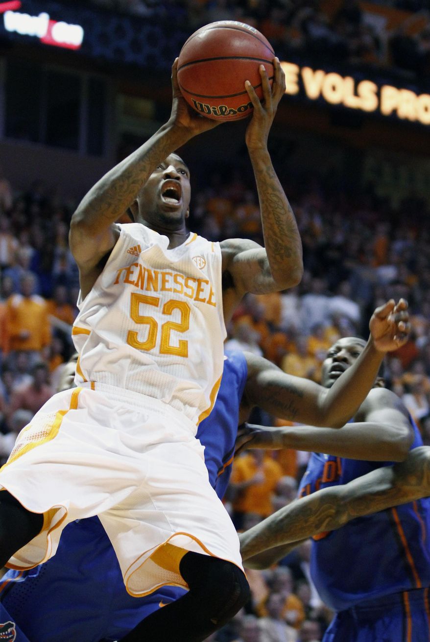 Tennessee guard Jordan McRae (52) shoots in the first half of an NCAA college basketball game against Florida, Tuesday, Feb. 11, 2014, in Knoxville, Tenn. (AP Photo/Wade Payne)