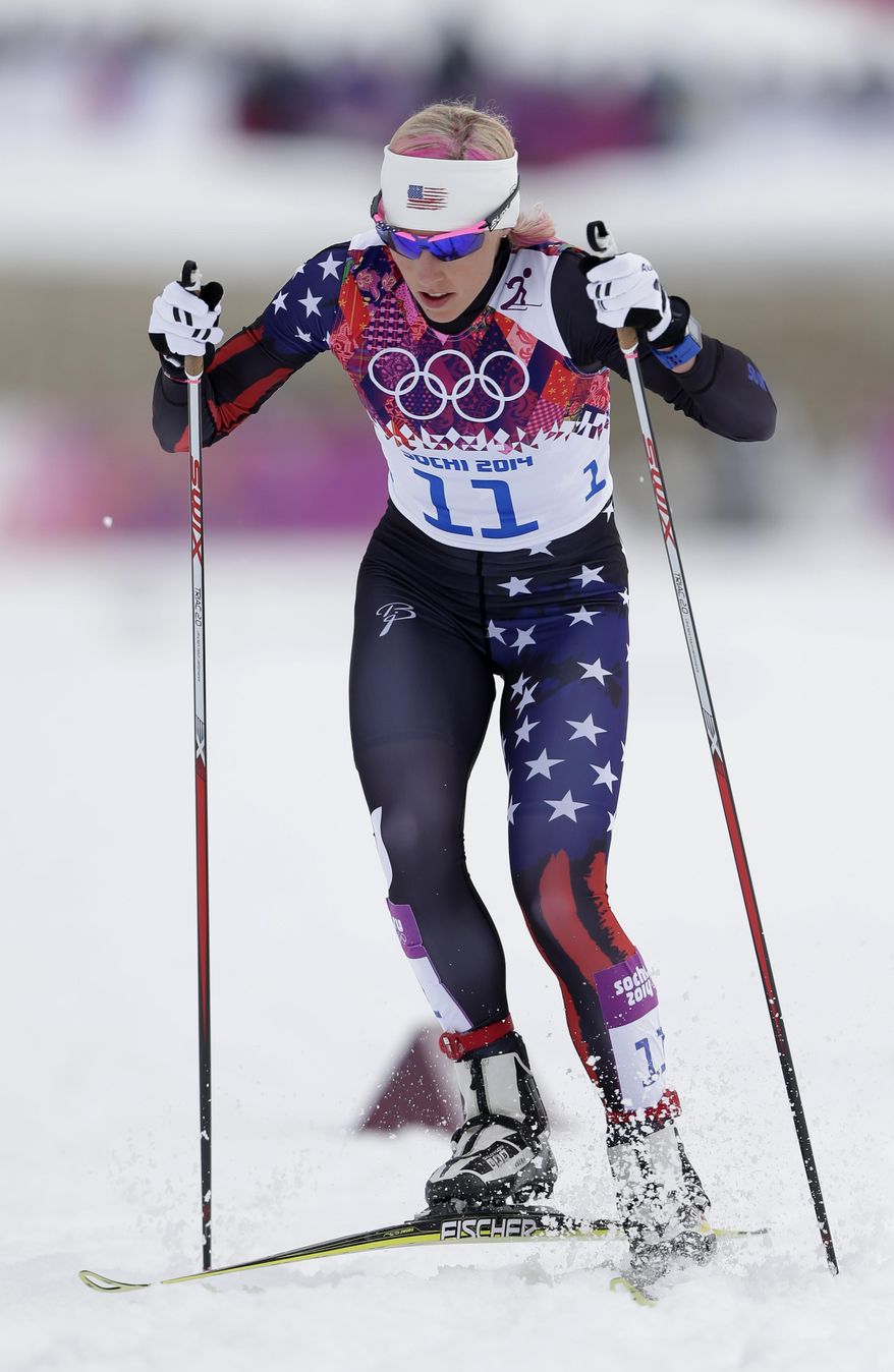 United States' Kikkan Randall starts the women's qualification of the cross-country sprint at the 2014 Winter Olympics, Tuesday, Feb. 11, 2014, in Krasnaya Polyana, Russia. (AP Photo/Matthias Schrader)