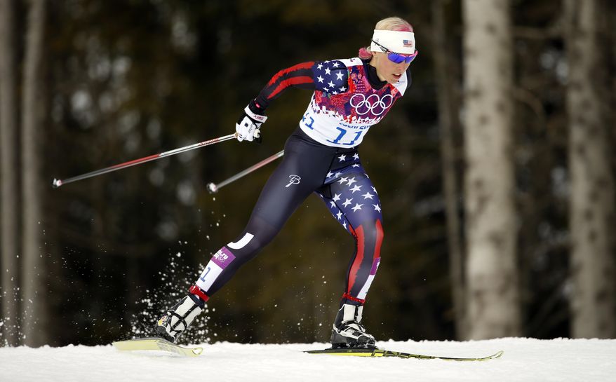 United States' Kikkan Randall competes during the women's qualifications of the cross-country sprint at the 2014 Winter Olympics, Tuesday, Feb. 11, 2014, in Krasnaya Polyana, Russia. (AP Photo/Felipe Dana)