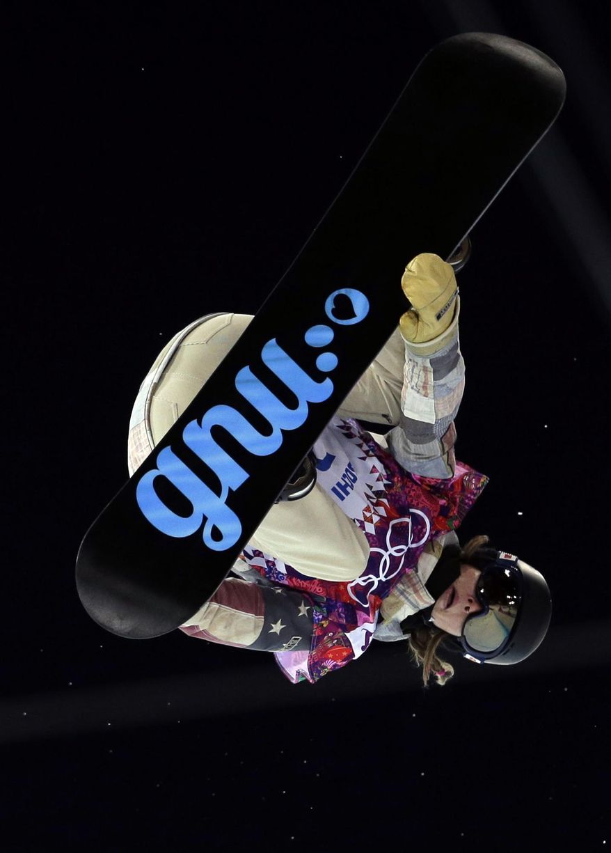 United States' Kaitlyn Farrington competes during the women's snowboard halfpipe final at the Rosa Khutor Extreme Park, at the 2014 Winter Olympics, Wednesday, Feb. 12, 2014, in Krasnaya Polyana, Russia. (AP Photo/Felipe Dana)