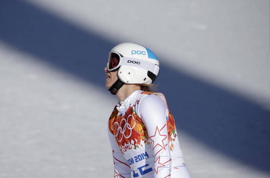 United States' Julia Mancuso reacts after finishing the women's downhill at the Sochi 2014 Winter Olympics, Wednesday, Feb. 12, 2014, in Krasnaya Polyana, Russia. (AP Photo/Gero Breloer)