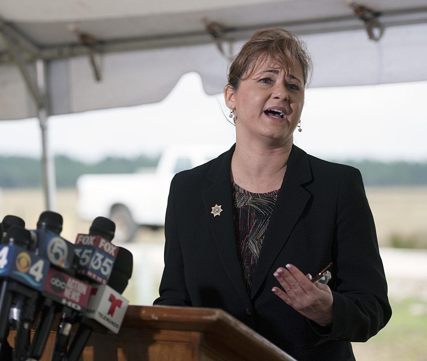 Jessica Cary, spokesperson for the Florida Department of Corrections, speaks to the media at the Florida State Prison near Starke, Fla., just hours before the execution of Juan Carlos Chavez who, in 1995, raped and murdered 9-yr-old Jimmy Ryce after he got off his school bus in Miami. (AP Photo/Phil Sandlin)