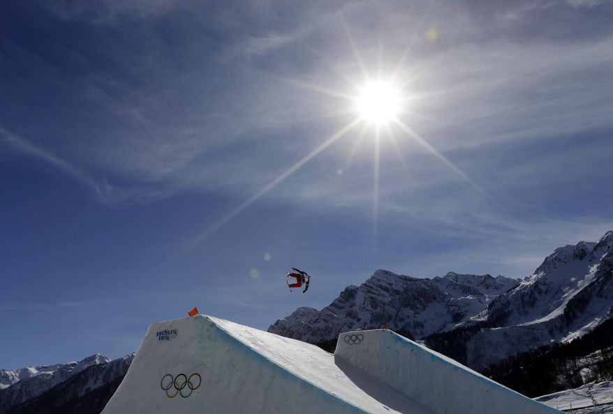 Nicholas Goepper of the United States takes a jump during men's ski slopestyle training at the Rosa Khutor Extreme Park, at the 2014 Winter Olympics, Wednesday, Feb. 12, 2014, in Krasnaya Polyana, Russia. (AP Photo/Andy Wong)