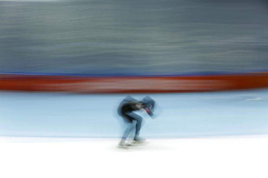 Shani Davis of the U.S. competes in the men's 1,000-meter speedskating race at the Adler Arena Skating Center during the 2014 Winter Olympics, in Sochi, Russia, Wednesday, Feb. 12, 2014. (AP Photo/Patrick Semansky)