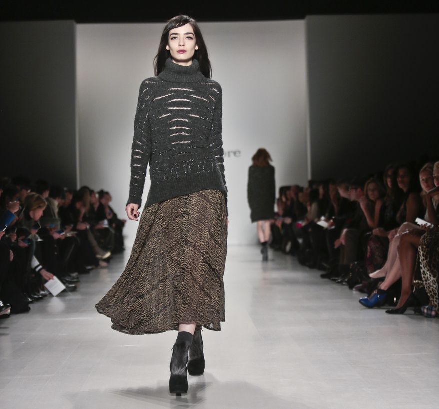 Fashion from the Nanette Lepore Fall 2014 collection is modeled during New York Fashion Week on Wednesday Feb. 12, 2014. (AP Photo/Bebeto Matthews)
