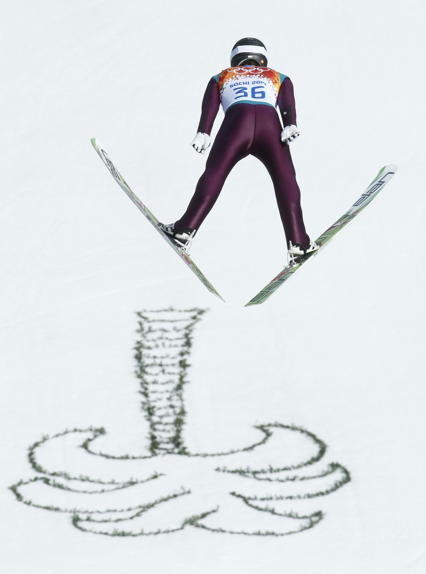 United States' Bryan Fletcher makes his attempt during the ski jumping portion of the Nordic combined at the 2014 Winter Olympics, Wednesday, Feb. 12, 2014, in Krasnaya Polyana, Russia. (AP Photo/Dmitry Lovetsky)