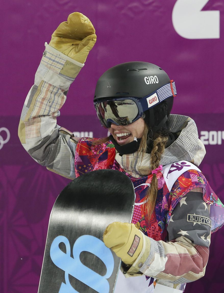 United States' Kaitlyn Farrington waves after her run during the women's snowboard halfpipe final at the Rosa Khutor Extreme Park, at the 2014 Winter Olympics, Wednesday, Feb. 12, 2014, in Krasnaya Polyana, Russia. (AP Photo/Sergei Grits)