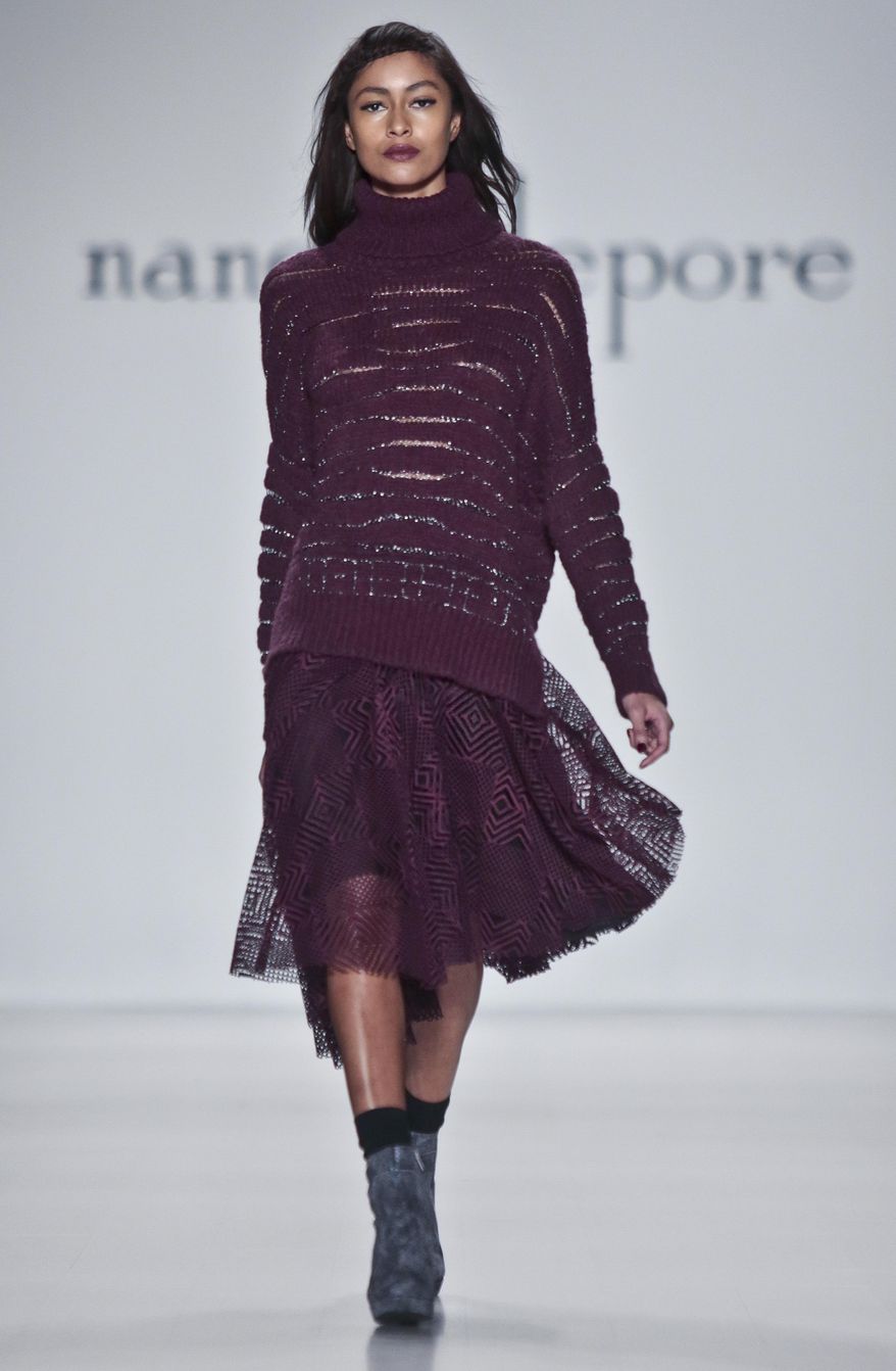 Fashion from the Nanette Lepore Fall 2014 collection is modeled during New York Fashion Week on Wednesday Feb. 12, 2014. (AP Photo/Bebeto Matthews)
