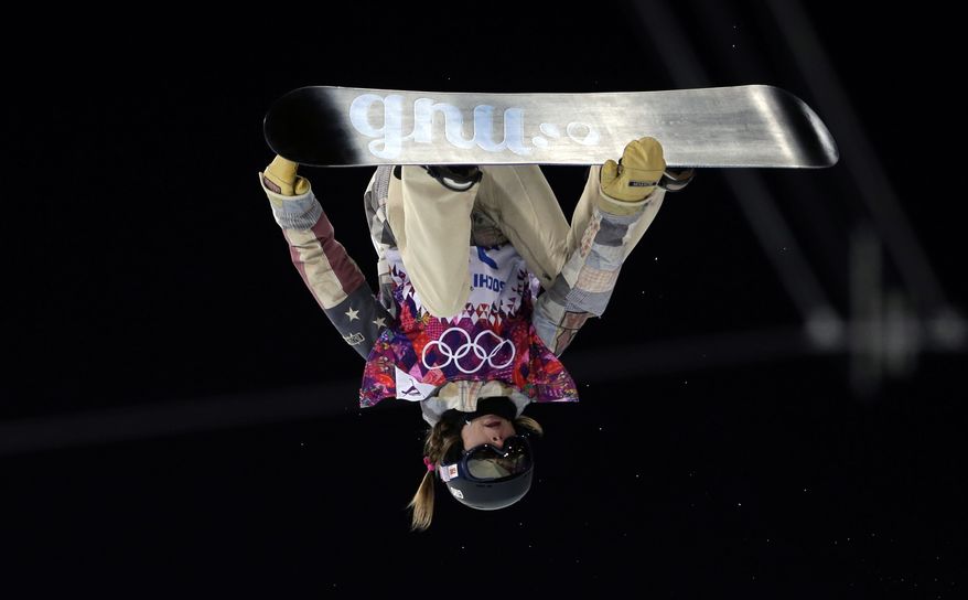 United States' Kaitlyn Farrington competes during the women's snowboard halfpipe final at the Rosa Khutor Extreme Park, at the 2014 Winter Olympics, Wednesday, Feb. 12, 2014, in Krasnaya Polyana, Russia. (AP Photo/Felipe Dana)