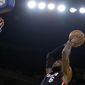 Miami Heat&#39;s LeBron James lays up a shot against the Golden State Warriors during the first half of an NBA basketball game on Wednesday, Feb. 12, 2014, in Oakland, Calif. (AP Photo/Ben Margot)