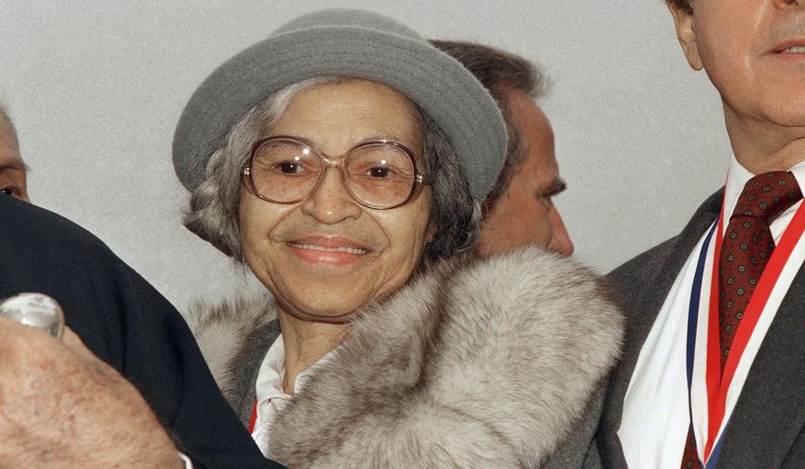 This Oct. 28, 1986, file photo shows Rosa Parks at Ellis Island in New York. (AP Photo, File) **FILE**