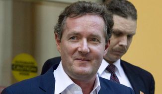 In this Dec. 20, 2011 file photo, Piers Morgan, host of CNN&#39;s &amp;quot;Piers Morgan Tonight,&amp;quot; leaves the CNN building in Los Angeles. (AP Photo/Jae C. Hong, File) ** FILE **