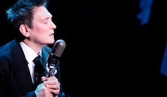 This image released by the O&amp;amp;M Co. shows k.d. lang, performing in the musical &amp;quot;After Midnight&amp;quot;, at the Brooks Atkinson Theatre in New York. (AP Photo/ O&amp;amp;M Co; Matthew Murphy)