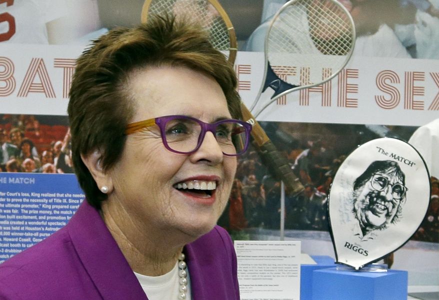 FILE - In this Sept. 5, 2013, file photo, Billie Jean King reflects about her match against Bobby Riggs in 1973 as she stands in front of a display at the U.S. Open tennis tournament in New York. King, who couldn't attend the opening of the Sochi Olympic Games because of her mother's death, will attend the closing ceremony with American speed skaters Bonnie Blair and Eric Heiden on Feb. 23 as part of President Barack Obama's official U.S. delegation. (AP Photo/Darron Cummings, File)