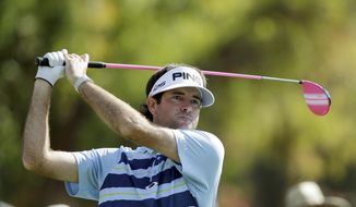 Bubba Watson drives on the second tee at the final round of the Northern Trust Open golf tournament at Riviera Country Club in the Pacific Palisades area of Los Angeles, Sunday, Feb. 16, 2014.  (AP Photo/Reed Saxon)