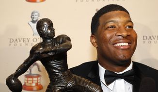 Florida State quarterback Jameis Winston, winner of the Davey O&#39;Brien National Quarterback Award answers questions during a news conference, Monday, Feb. 17, 2014, in Fort Worth, Texas. The award goes to the nation&#39;s top quarterback. (AP Photo/ The Fort Worth Star-Telegram, Richard W Rodriguez) MAGS OUT; (FORT WORTH WEEKLY, 360 WEST); INTERNET OUT.