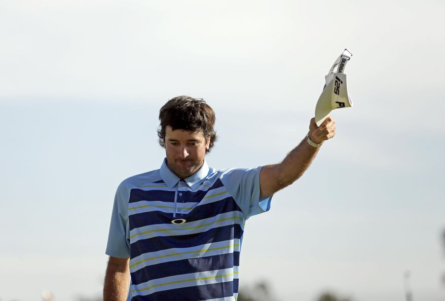 Bubba Watson celebrates his birdie putt on the 18th green on his way to victory in the Northern Trust Open golf tournament at Riviera Country Club in the Pacific Palisades area of Los Angeles, Sunday, Feb. 16, 2014. Watson carded a 15-under-par 269, two strokes ahead of the second-place finisher. (AP Photo/Reed Saxon)
