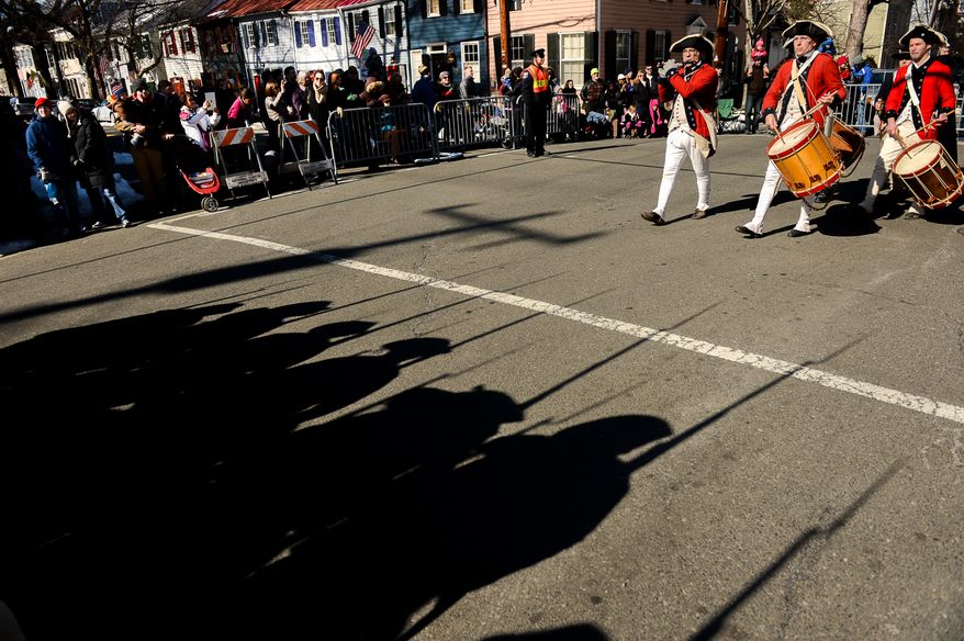 Members of the 1st Virginia Regiment march in the annual Old Town Alexandria President's Day Parade, Alexandria, Va., Monday, February 17, 2014. (Andrew Harnik/The Washington Times)
