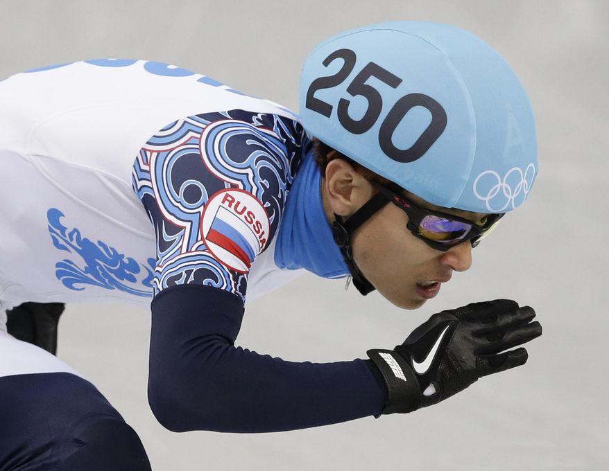 Victor An of Russia competes in a men's 500m short track speedskating heat at the Iceberg Skating Palace during the 2014 Winter Olympics, Tuesday, Feb. 18, 2014, in Sochi, Russia. (AP Photo/Darron Cummings)