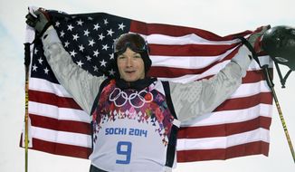 David Wise, of the United States, celebrates after winning a gold medal in the men&#39;s ski halfpipe final at the Rosa Khutor Extreme Park, at the 2014 Winter Olympics, Tuesday, Feb. 18, 2014, in Krasnaya Polyana, Russia. (AP Photo/Jae C. Hong)