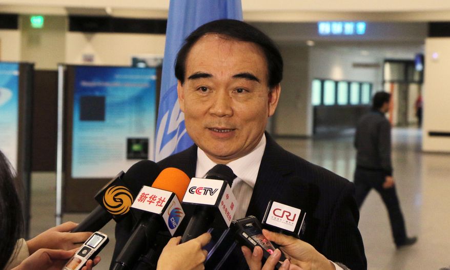 Li Baodong China's Vice Minister of Foreign Affairs speaks to media during closed-door nuclear talks in Vienna, Austria, Tuesday, Feb. 18, 2014. Iran and six world powers are back at the negotiating table eager to come to terms on a comprehensive nuclear deal but deeply divided on what it should look like. The two sides began meeting Tuesday in attempts to build on a first-step accord that temporarily curbs Tehran's nuclear activities in exchange for some sanctions relief. (AP Photo/Ronald Zak)