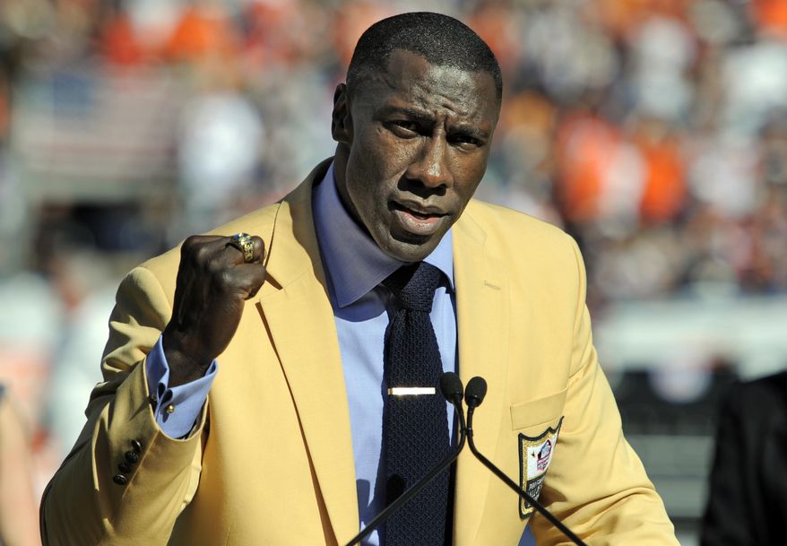 FILE - In this Sept. 18, 2011 file photo, Shannon Sharpe smiles after receiving his Hall of Fame ring during an NFL football game between the Denver Broncos and the Cincinnati Bengals, in Denver. Longtime analysts Dan Marino and Shannon Sharpe will not return to CBS' "The NFL Today" pregame show. CBS chief Sean McManus said in a statement that "Dan and Shannon are true Hall of Famers on the field and in front of the camera. As they pursue other professional opportunities, we thank them for their hard work and dedication and wish them nothing but the best." (AP Photo/ Jack Dempsey, File)