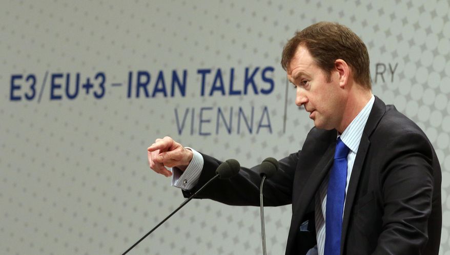 Michael Mann, spokesperson for EU foreign policy chief Catherine Ashton spekes to press during closed-door nuclear talks in Vienna, Austria, Tuesday, Feb. 18, 2014. Iran and six world powers are back at the negotiating table eager to come to terms on a comprehensive nuclear deal but deeply divided on what it should look like. The two sides began meeting Tuesday in attempts to build on a first-step accord that temporarily curbs Tehran's nuclear activities in exchange for some sanctions relief. (AP Photo/Ronald Zak)