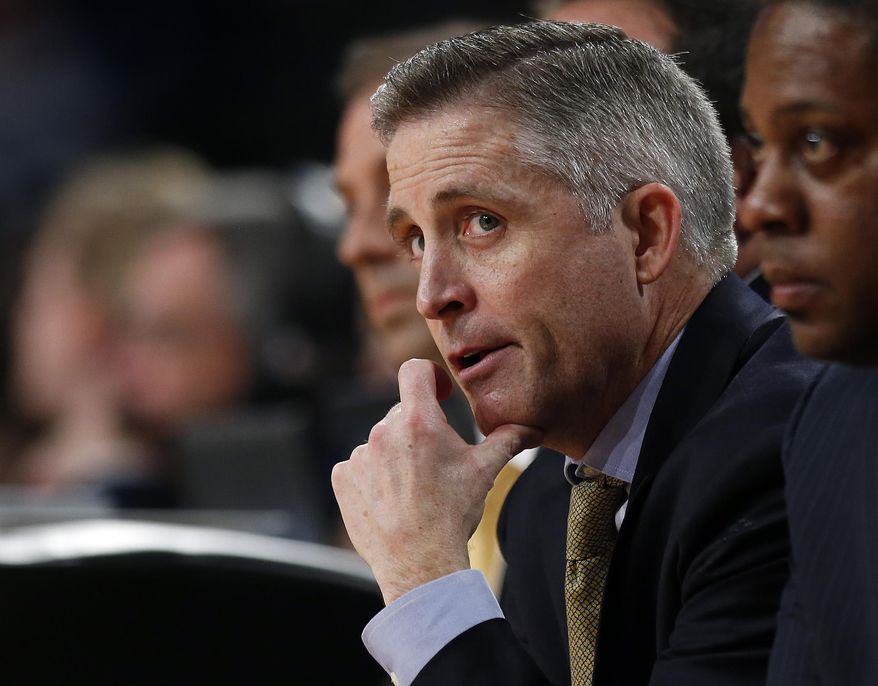 Georgia Tech head coach Brian Gregory watches from the bench in the first half of an NCAA college basketball game against Duke, Tuesday, Feb. 18, 2014, in Atlanta. (AP Photo/John Bazemore)