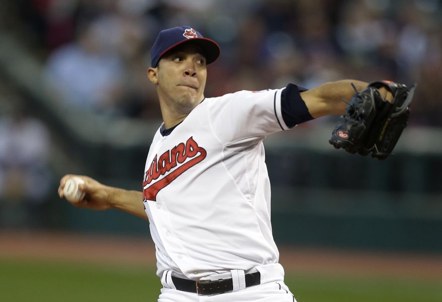 FILE - In this Sept. 24, 2013 file photo, Cleveland Indians starting pitcher Ubaldo Jimenez delivers in the first inning of a baseball game against the Chicago White Sox in Cleveland. A person familiar with the situation said Monday, Feb. 17, 2014, free-agent pitcher Ubaldo Jimenez and the Baltimore Orioles have agreed to a contract, pending a physical. (AP Photo/Tony Dejak, File)
