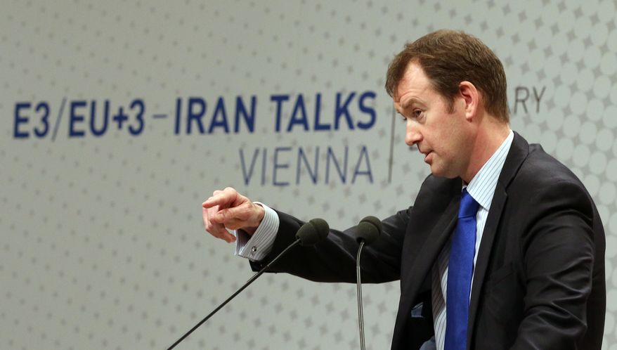 Michael Mann, spokesperson for EU foreign policy chief Catherine Ashton spekes to press during closed-door nuclear talks in Vienna, Austria, Tuesday, Feb. 18, 2014. Iran and six world powers are back at the negotiating table eager to come to terms on a comprehensive nuclear deal but deeply divided on what it should look like. The two sides began meeting Tuesday in attempts to build on a first-step accord that temporarily curbs Tehran's nuclear activities in exchange for some sanctions relief. (AP Photo/Ronald Zak)