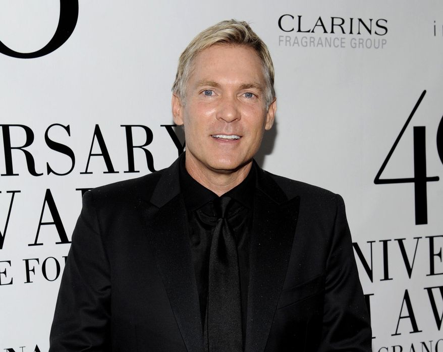 FILE - This May 21, 2012 file photo shows Sam Champion at the FiFi Fragrance Awards at Alice Tully Hall in New York. Champion's new Weather Channel morning program, "America's Morning Headquarters with Sam Champion," or, for short, "AMHQ," which debuts March 17 will return him to the a.m. scene where he hailed as weather anchor on ABC's New York-based "Good Morning America." (AP Photo/Evan Agostini, file)