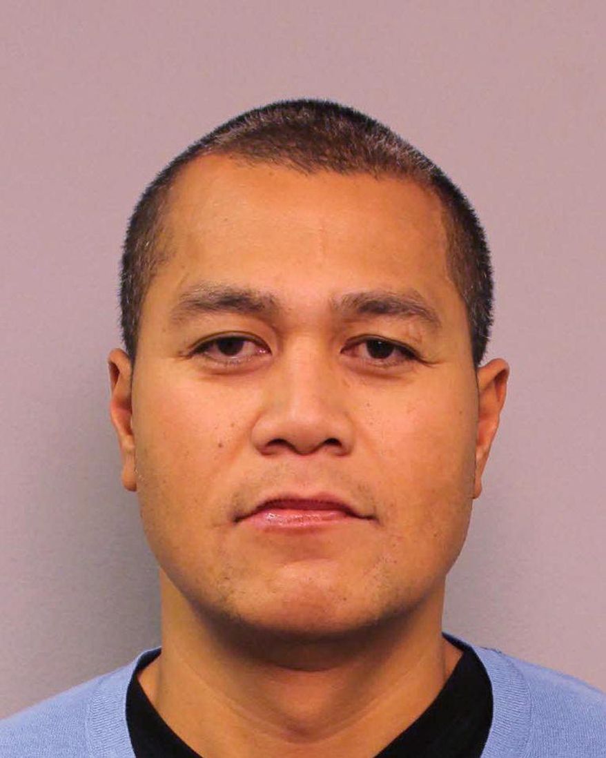 A photo provided by the Nashville Police Department is of Vanderbilt defenseive line coach Vavae Tata who is charged with drunk driving and leaving the scene of an accident Sunday FeVanderbilt coach b. 16, 2014. Tata was indefinately suspened by coach Derek Mason Tuesday, Feb. 18. (AP Photo)