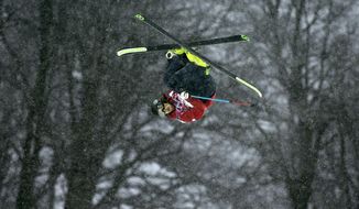 France&#39;s Kevin Rolland competes during the men&#39;s freestyle skiing halfpipe qualification at the Rosa Khutor Extreme Park, at the 2014 Winter Olympics, Tuesday, Feb. 18, 2014, in Krasnaya Polyana, Russia. (AP Photo/Jae C. Hong)