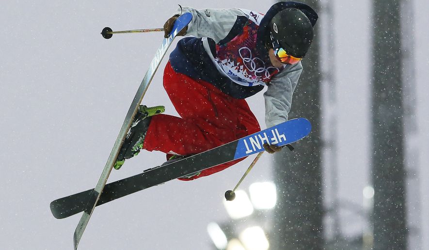 David Wise of the United States gets air during men&#39;s ski half pipe qualifying at the Rosa Khutor Extreme Park, at the 2014 Winter Olympics, Tuesday, Feb. 18, 2014, in Krasnaya Polyana, Russia. (AP Photo/Sergei Grits)