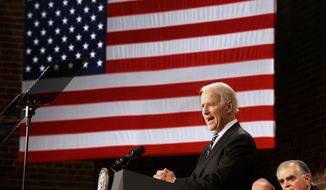 Vice President Joe Biden speaks at America&#39;s Central Port in Granite City, Ill., Wednesday, Feb. 19, 2014, to mark the fifth anniversary of the American Recovery and Reinvestment Act (ARRA). At right is former Transportation Secretary Ray LaHood. (AP Photo/Seth Perlman)