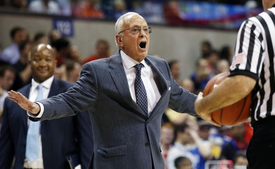 SMU head coach Larry Brown shows his displeasure to an official on a foul called during the first half of an NCAA basketball game against Houston on Wednesday, Feb. 19, 2014, in Dallas. (AP Photo/John F. Rhodes)