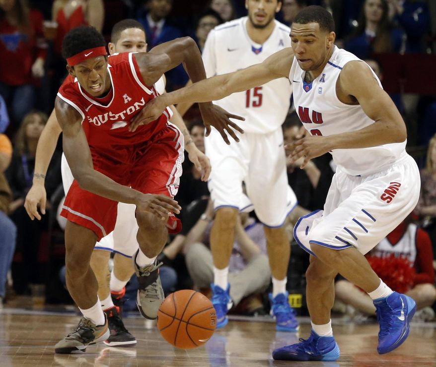 Houston forward Danrad Knowles (0) and SMU guard Nick Russell (12) chase a loose ball during the first half of an NCAA basketball game on Wednesday, Feb. 19, 2014, in Dallas. (AP Photo/John F. Rhodes)
