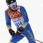 Ukraine&#39;s Dmytro Mytsak finishes the first run of the men&#39;s giant slalom at the Sochi 2014 Winter Olympics, Wednesday, Feb. 19, 2014, in Krasnaya Polyana, Russia. (AP Photo/Gero Breloer)