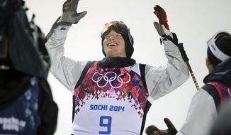 David Wise, of the United States, celebrates after winning a gold medal in the men&#39;s ski halfpipe final at the Rosa Khutor Extreme Park, at the 2014 Winter Olympics, Tuesday, Feb. 18, 2014, in Krasnaya Polyana, Russia. (AP Photo/Jae C. Hong)
